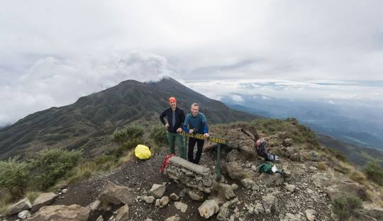 A dramatic landscape view from a cave, representing Meru's crater