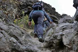 Giant black rocks scattered across the Namanga hills
